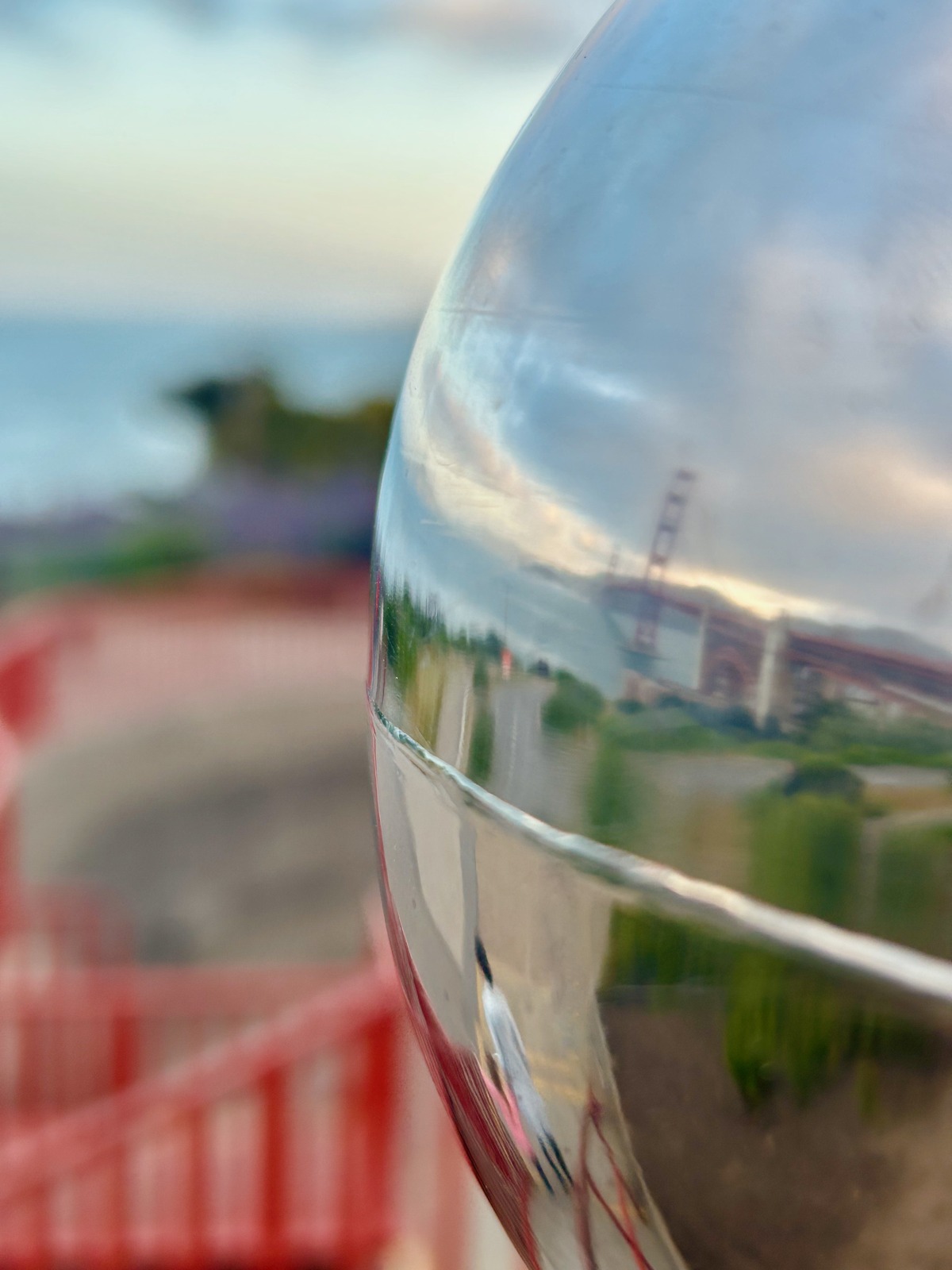 Reflection of family an Golden Gate Bridge